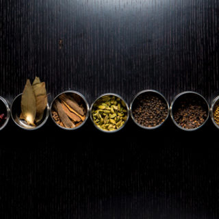 basic indian spices - row of spices in bowls