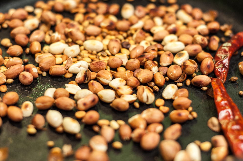 Stuffed Baby Eggplants - peanuts chana dal coriander seeds and chilies roasting